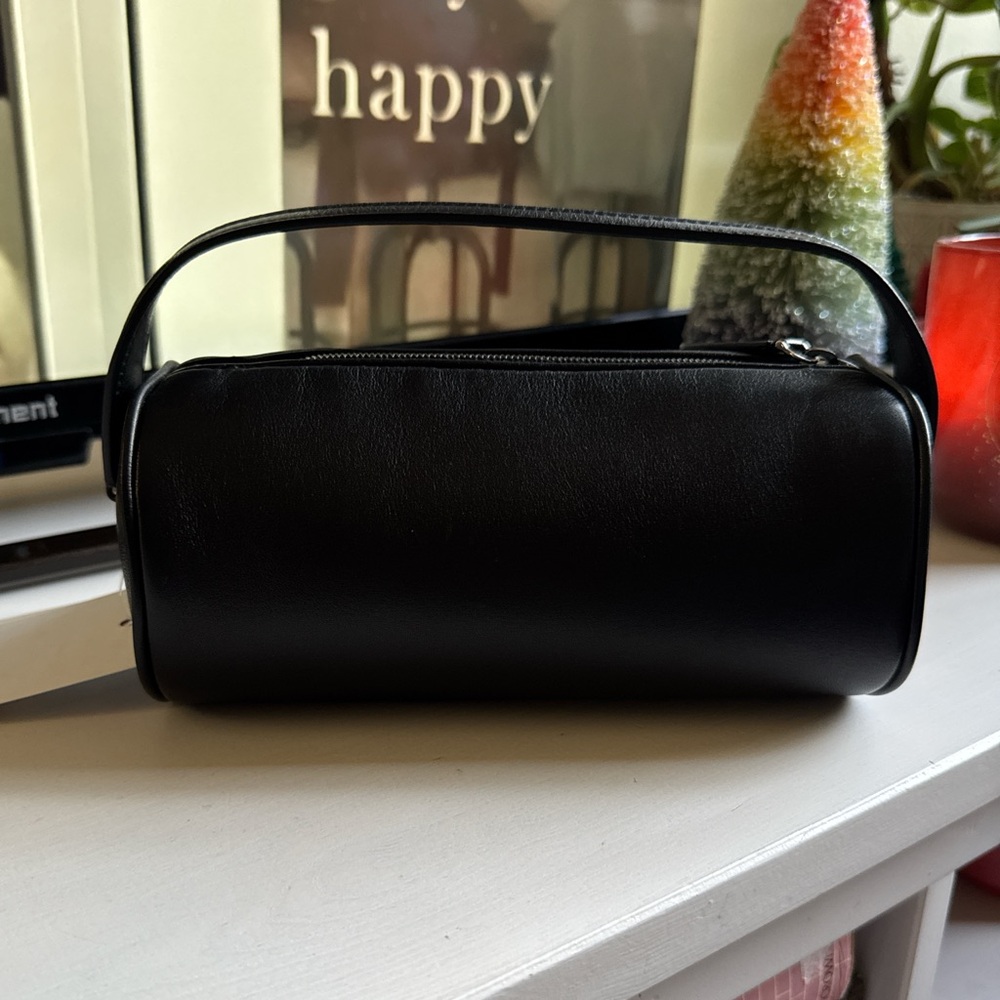The row 90's bag